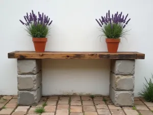 Rustic Block Console Table - A rustic outdoor console table constructed from weathered cinder blocks and reclaimed wood planks, decorated with terracotta pots of lavender, aerial view against a white garden wall