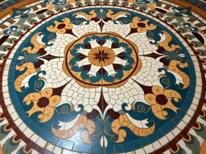 Mosaic Pattern Epoxy - Close-up of an intricate mosaic pattern created in epoxy flooring, featuring Mediterranean-inspired designs