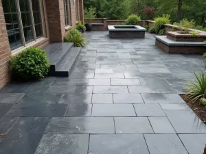 Rustic Slate Effect - Wide shot of a textured slate-effect epoxy patio floor in varying shades of charcoal and gray