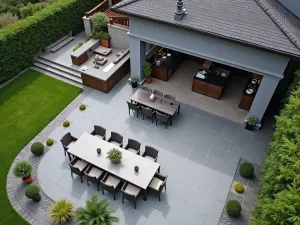 Slate-Look Porcelain Entertaining Area - Aerial view of a large entertaining area with slate-effect porcelain tiles, outdoor kitchen, and dining space