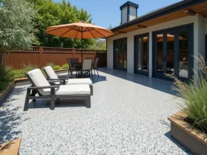 Terrazzo Style Epoxy - Modern patio featuring terrazzo-style epoxy flooring with multicolored chips in a light gray base