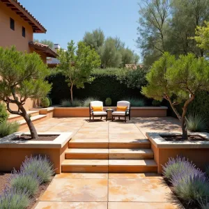 Mediterranean Modern - Sun-washed concrete patio with terraced levels, featuring acid-stained concrete in warm earth tones, built-in olive tree planters, and contemporary interpretation of Mediterranean tiles. Lavender borders and rosemary hedges add traditional charm