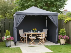 Portable Pop-Up Canopy - Versatile small patio setup with a collapsible pop-up canopy in charcoal gray, surrounded by wheeled planters with colorful annuals