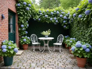 Cobblestone Vintage Charm - Reclaimed cobblestone patio with antique brick borders, featuring climbing hydrangeas and vintage metal furniture